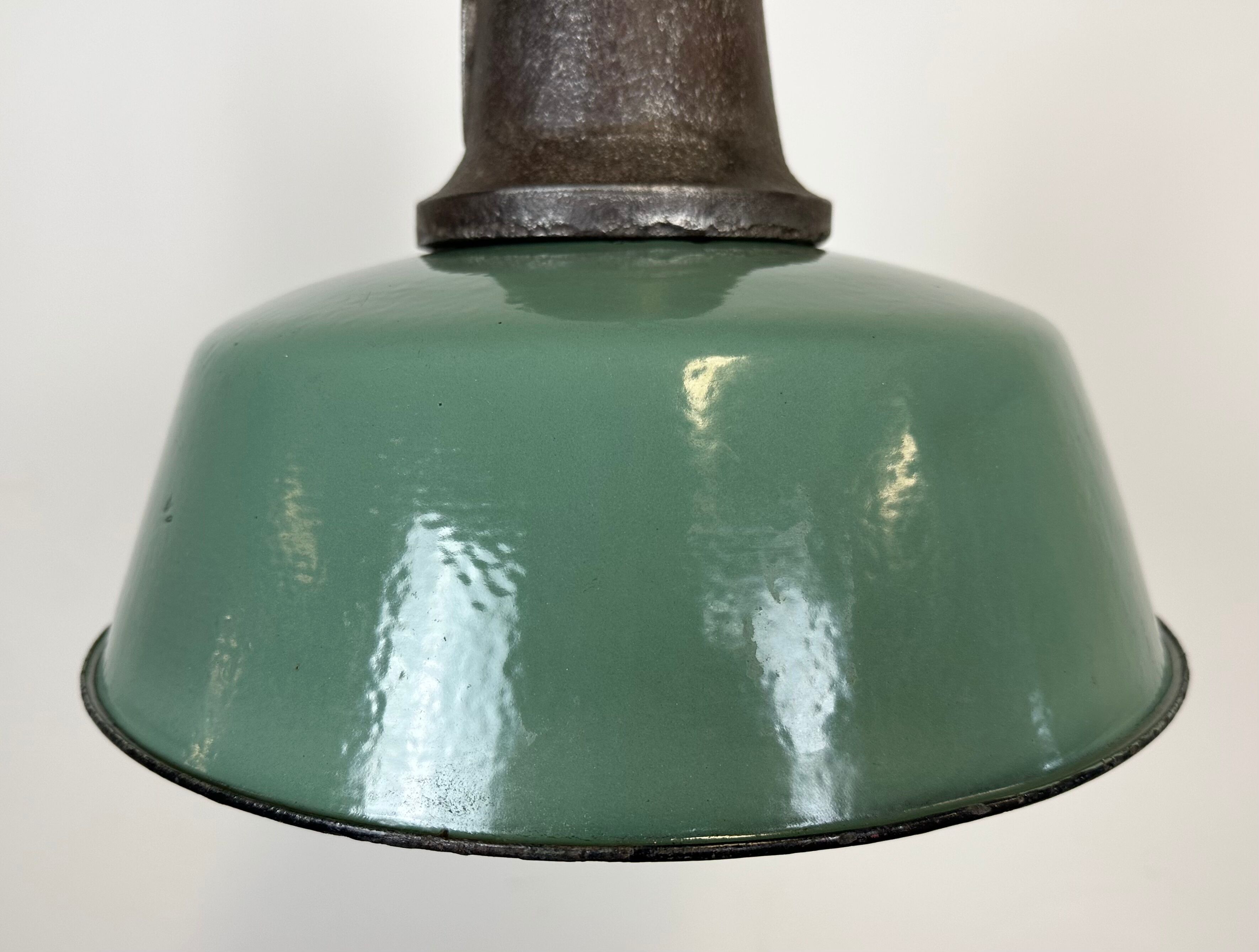 Industrial green enamel factory lamp with cast iron top, 1960s