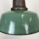 Industrial green enamel factory lamp with cast iron top, 1960s