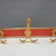 Vintage bistro coat rack with 3 patères gold and red hooks