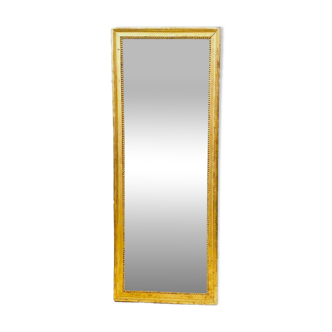 Louis XVI mirror in carved and gilded wood with leaf 18th century