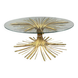 Gold metal and glass coffee table, 20th century, in the style of Robert Goos.