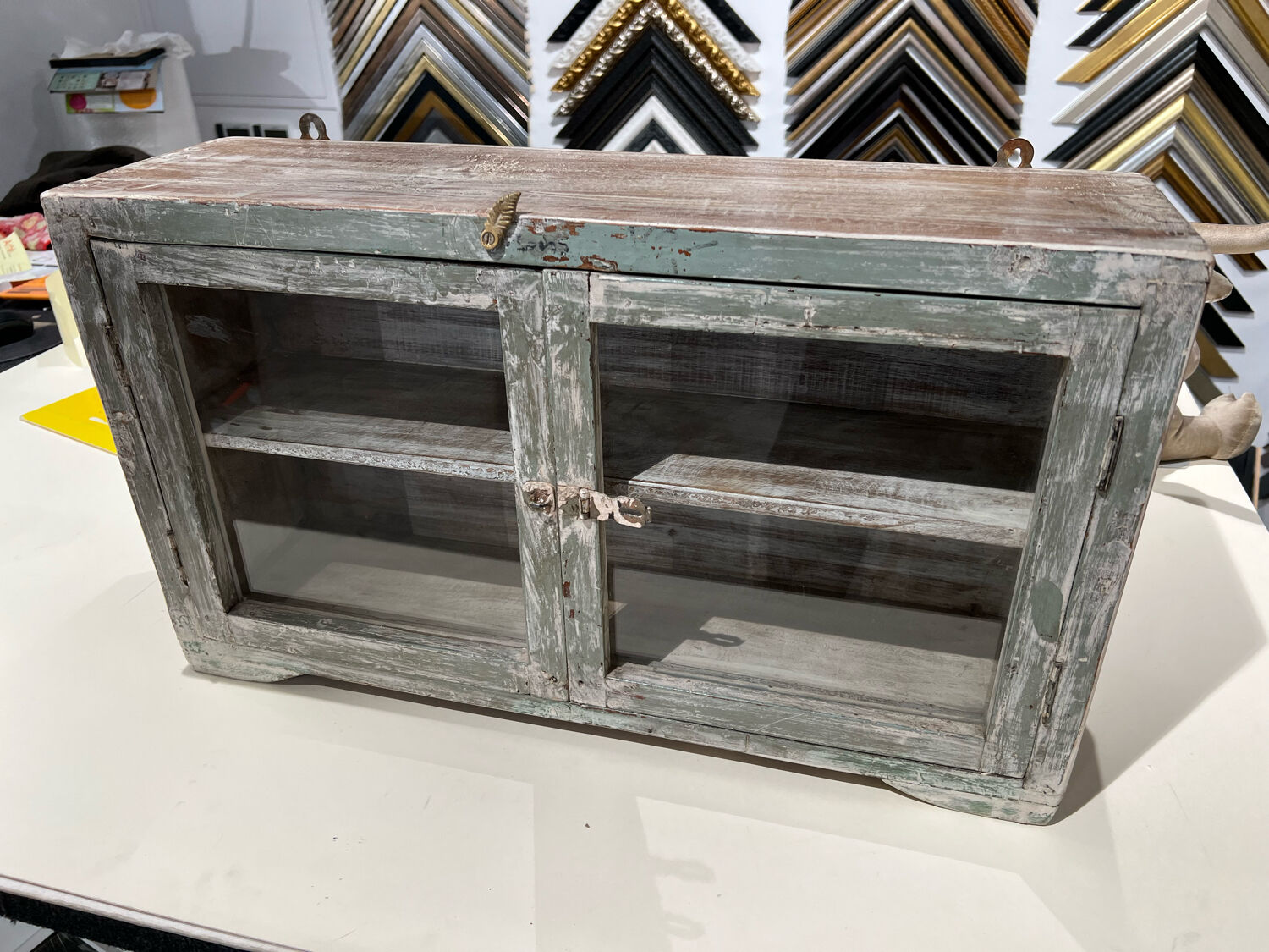 Small teak wall shelf