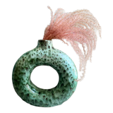 Handmade terracotta donut vase in light green terracotta