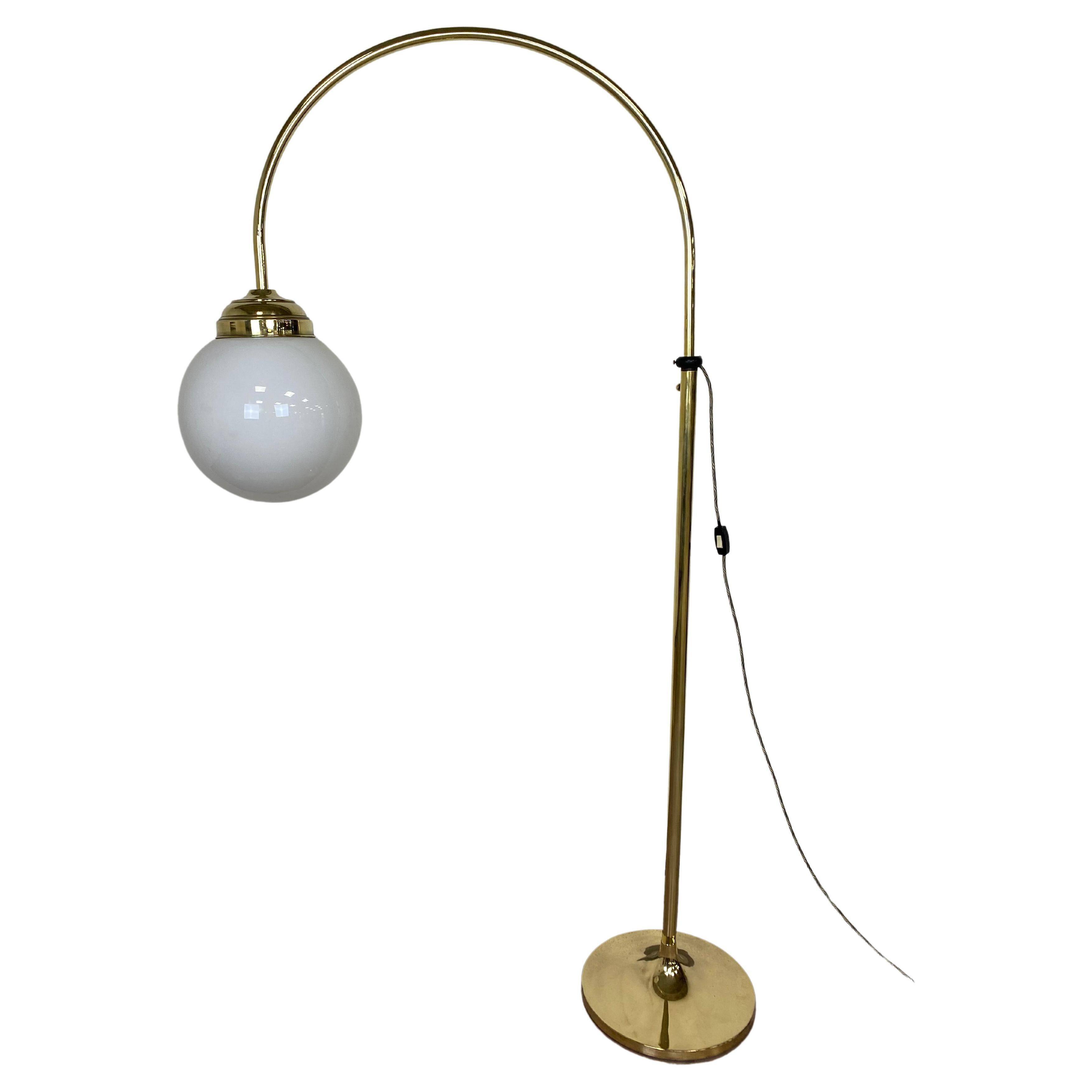 Large Art Deco floor lamp in brass