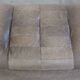 Luxurious, comfortable, gray leather vintage footstool