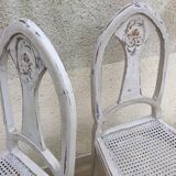 Pair of old white canne chairs