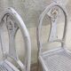 Pair of old white canne chairs