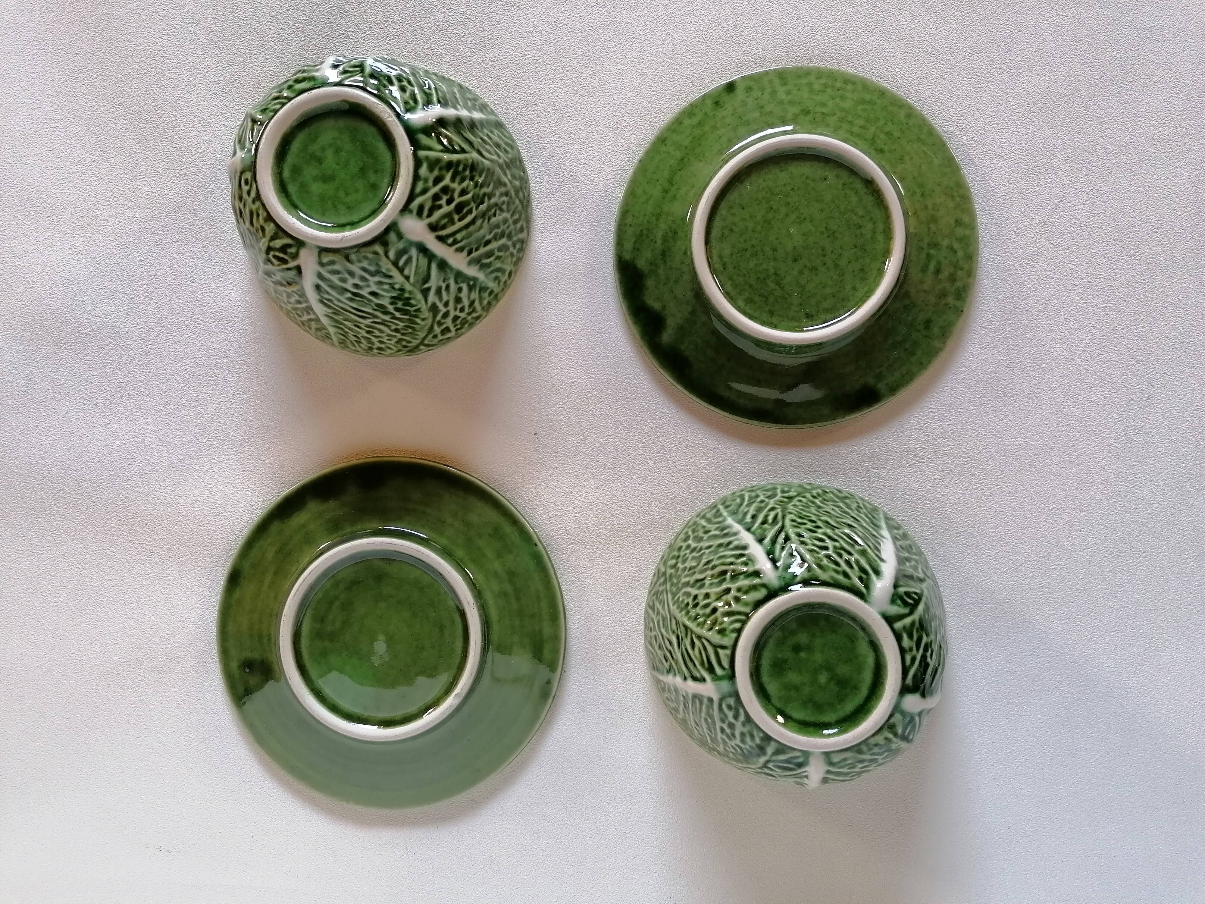 Lot bowls and plates in dabbling cabbage leaves