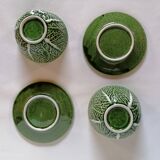 Lot bowls and plates in dabbling cabbage leaves