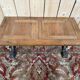 Table basse pieds fonte et plateau bois parquet