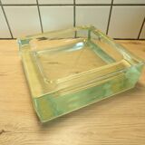 Glass block pocket emptier