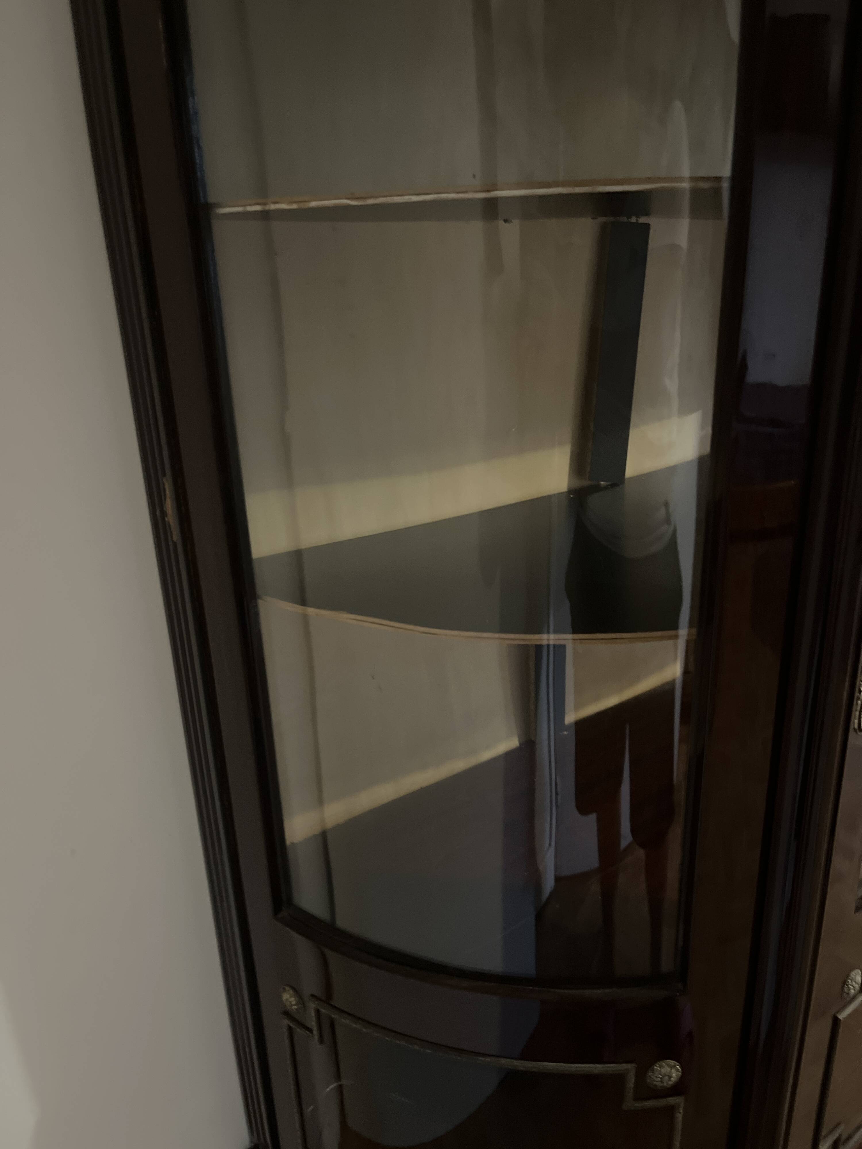 Curved display cabinet in Louis XVI style