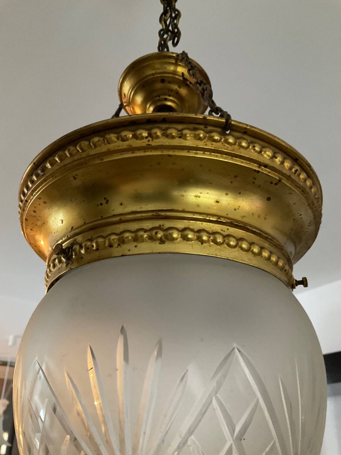 Vintage pendant light in chiseled glass and brass