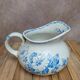 Small antique ironstone jug L.m Creil and Montereau with blue floral decoration.