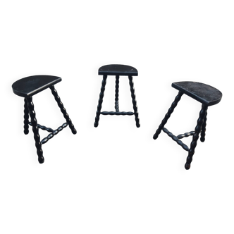 Set of tripod stools with fluted legs