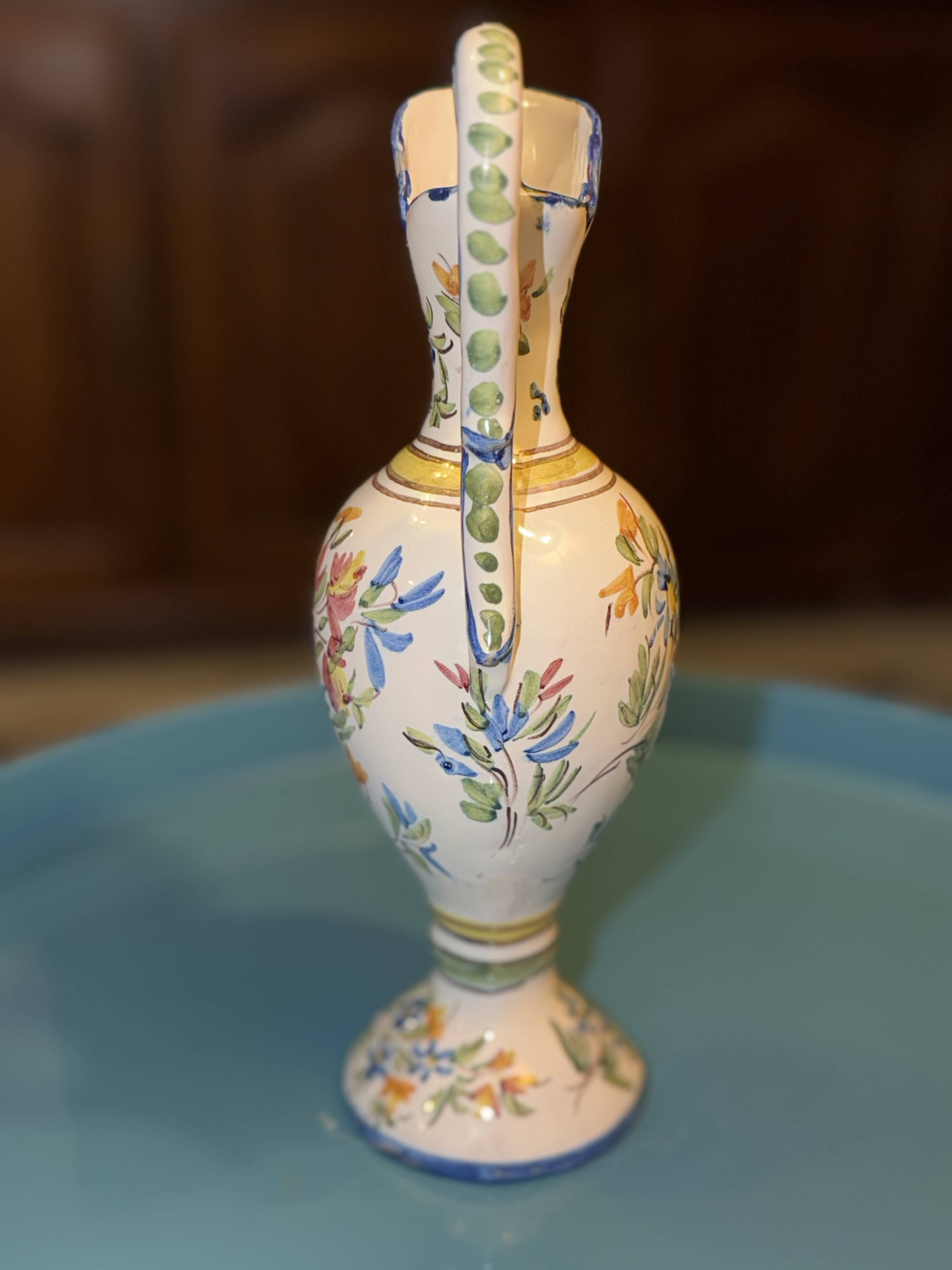 Jug / Pitcher in earthenware with floral decoration in Rouen style signed M.F.