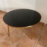Table basse plateau verre noir et pieds compas dorés