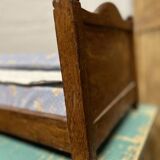 Lit de poupée ancien en bois vernis