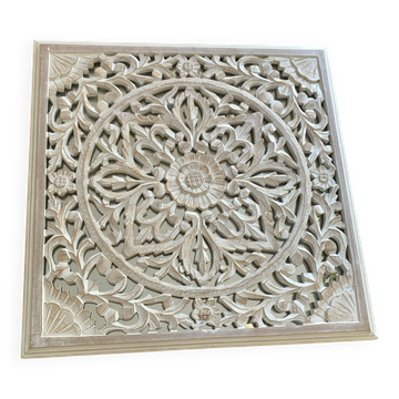 Magnificent carved frame with an interior mirror made of mango wood.