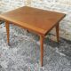 Oak table has two vintage extensions