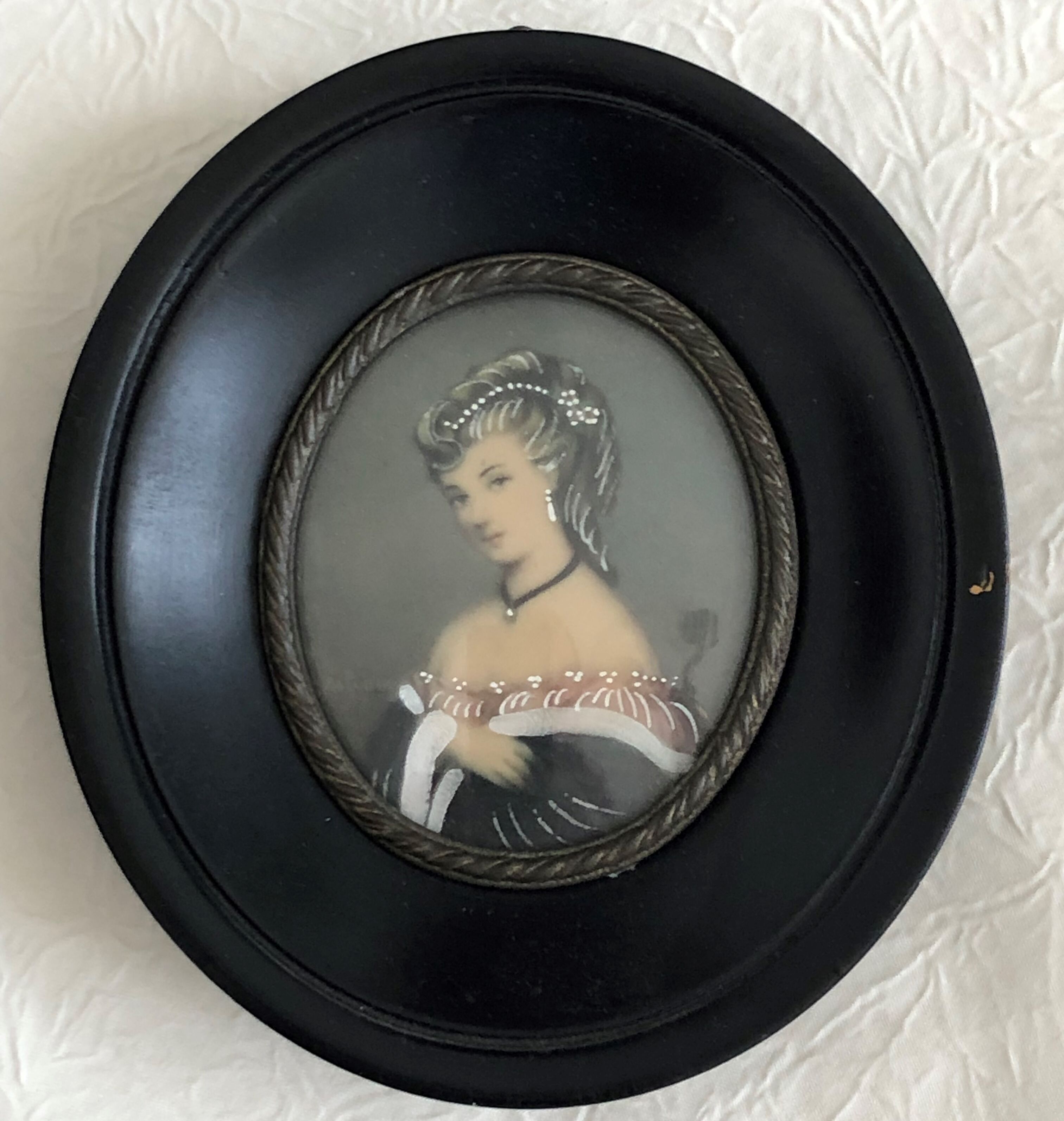 Portrait of a miniature young woman
