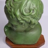 Bust of Eros in patinated plaster in imitation of bronze on wooden base