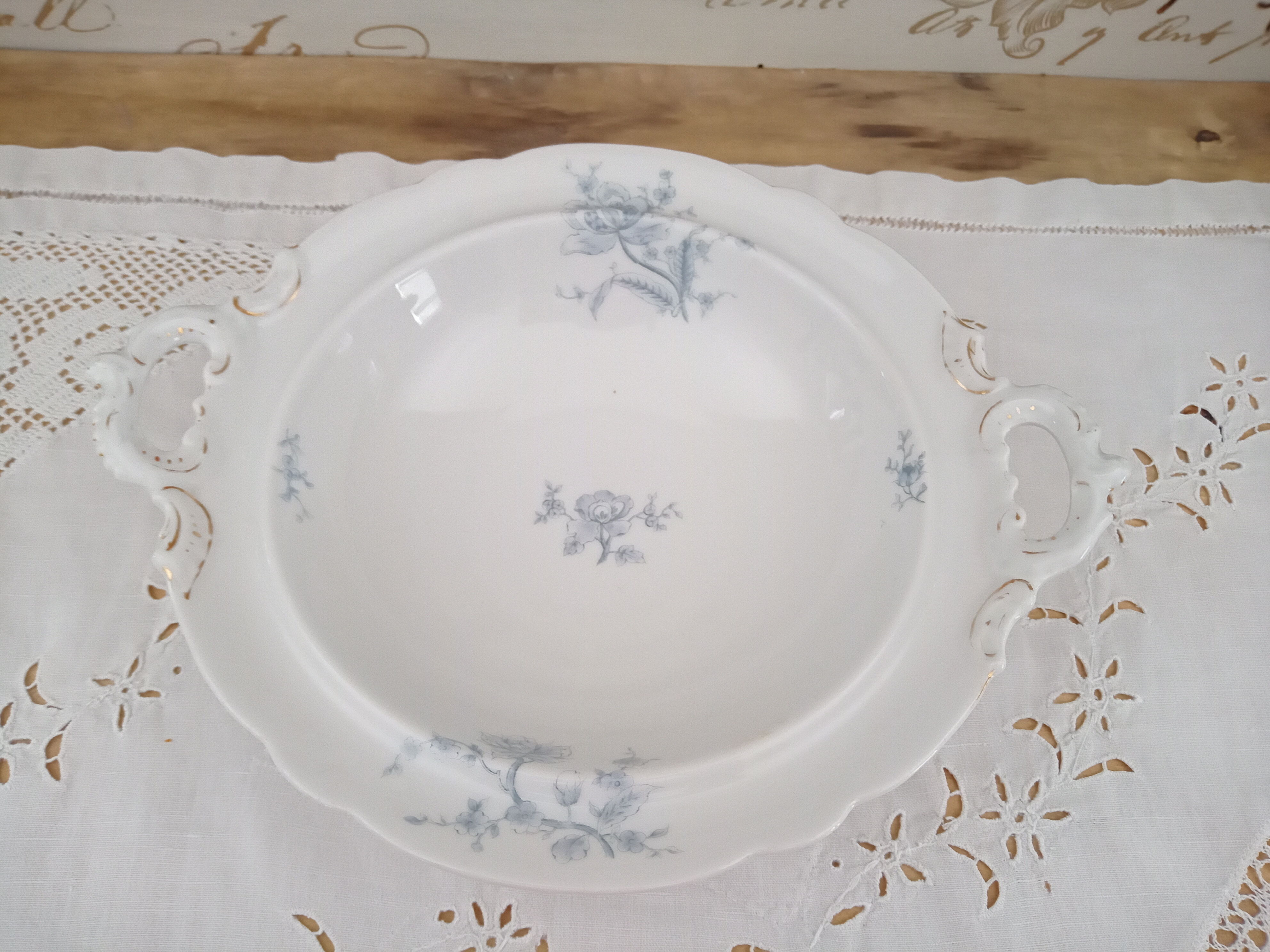 Compotier on porcelain pedestal decoration pale blue flowers
