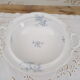 Compotier on porcelain pedestal decoration pale blue flowers