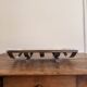 Art Deco metal plate, silvered, hammered on a flat vintage serving stand.