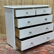 English chest of drawers painted in fir with glass knobs, 19th century