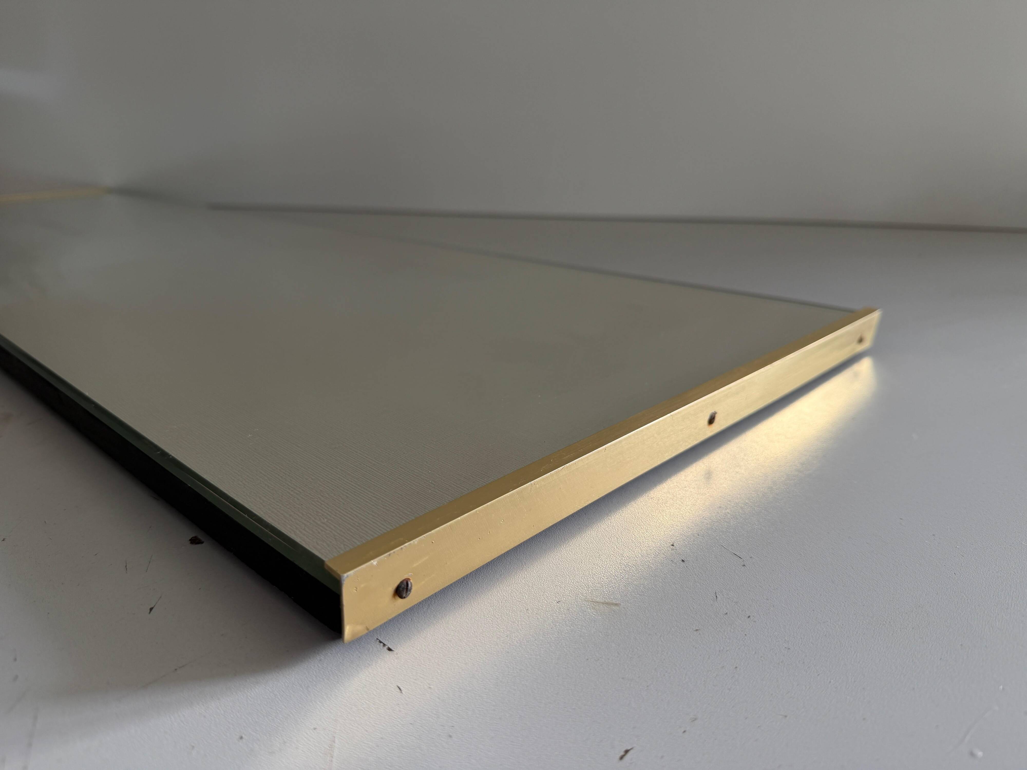 Minimalist rectangular wall mirror with a brass frame, 1960s, Germany
