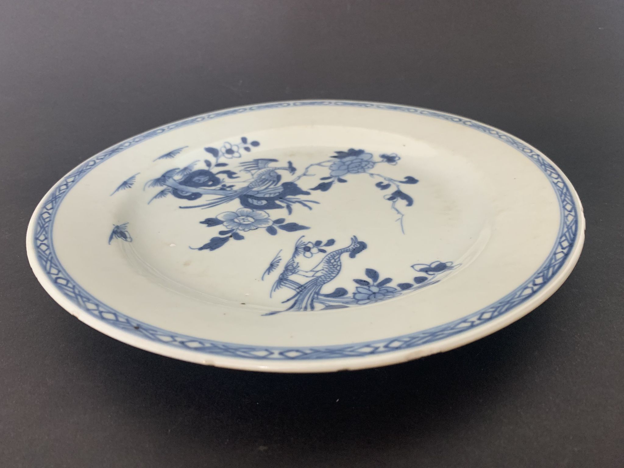 Blue and white porcelain plate of the blue family, 19th century