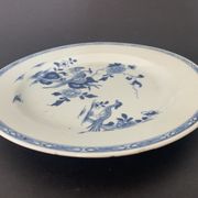 Blue and white porcelain plate of the blue family, 19th century