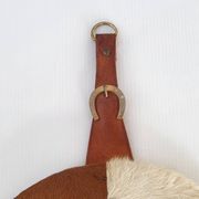 Vintage 1970s cowhide horseshoe mirror