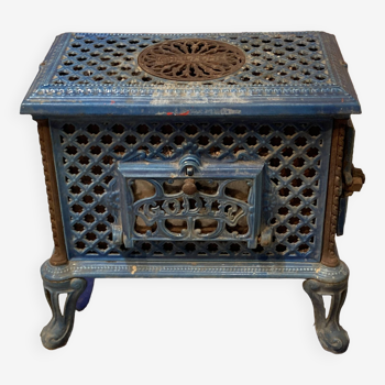 Cast iron and blue ceramic wood stove, from the Chauffette brand