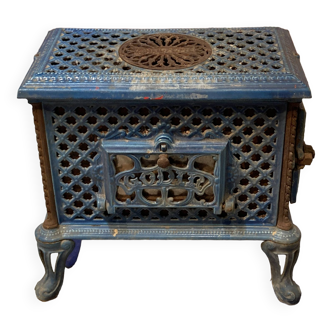 Poêle à bois en fonte et céramique bleu, de la marque Chauffette