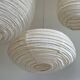 Average suspension in rattan and natural linen, Japanese-style, oval and flattened, H30 D4.