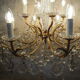 Chandelier 12 lamps with grapevines in crystal, bronze and regulated