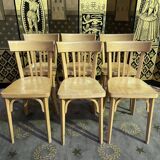 Suite of 6 bistro chairs signed "baumann"