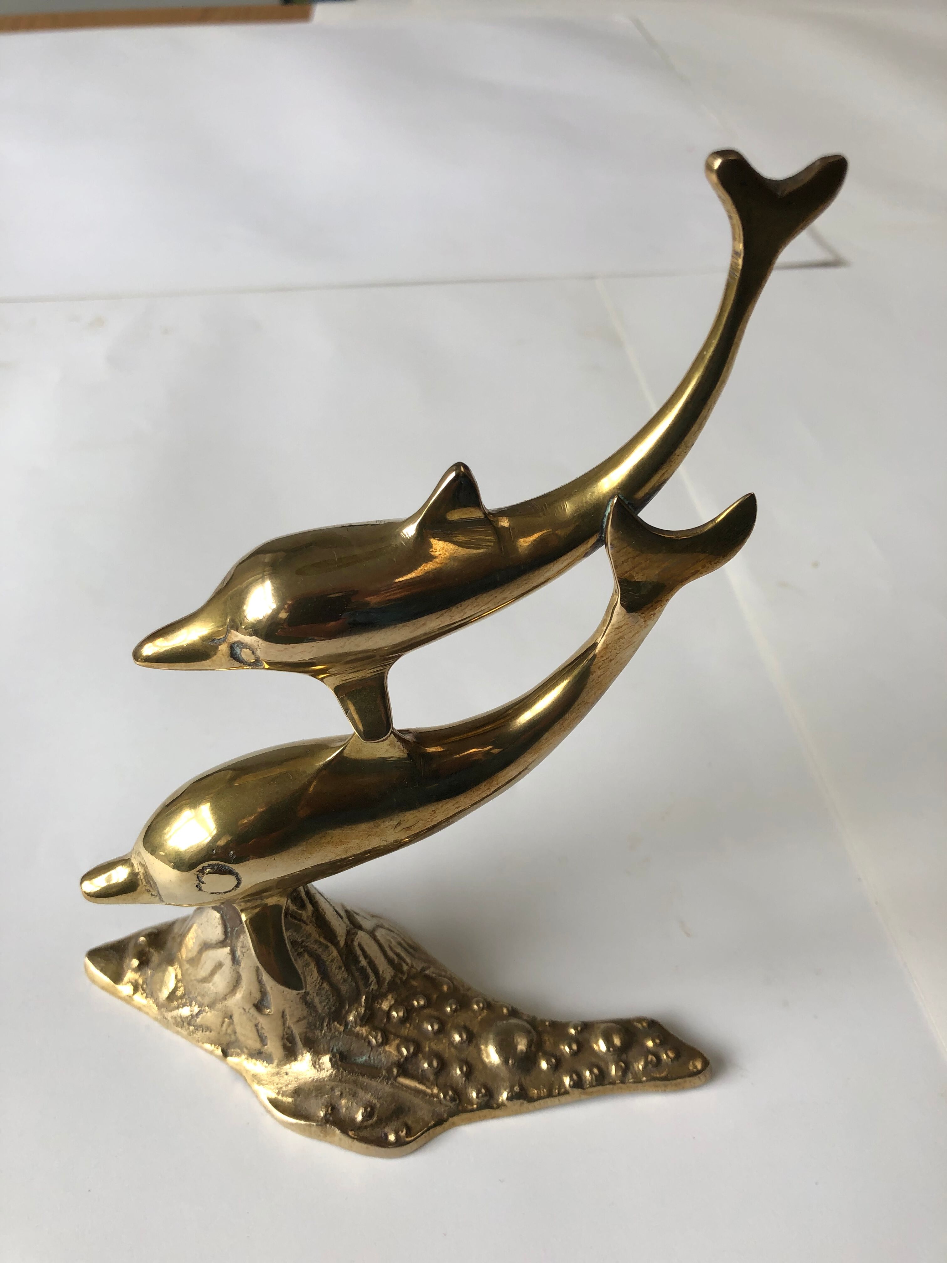 Dauphins en laiton