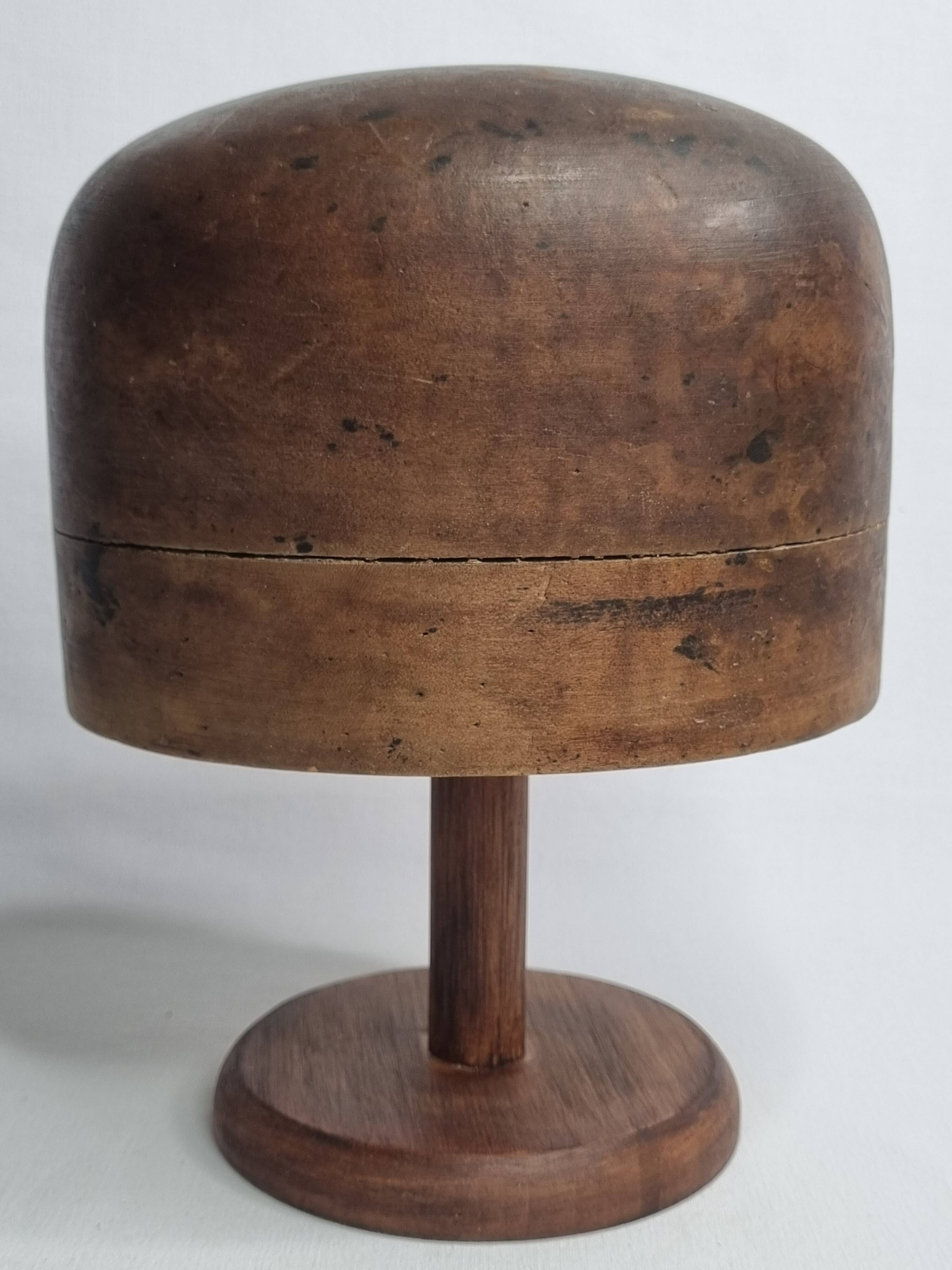 Standing wooden hat shape, 1900