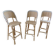Lot of 3 Maison Louis Drucker light Manila rattan bistro high chairs.