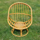 Fauteuil en rotin pivotant