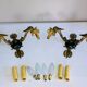 Empire bronze sconces with decorations of swans, palmettes and acanthus leaves