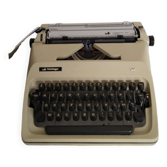 Machine à écrire portative Scheidegger , fonctionnelle , ruban neuf
