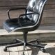 POLLOCK black leather reclining armchair with casters