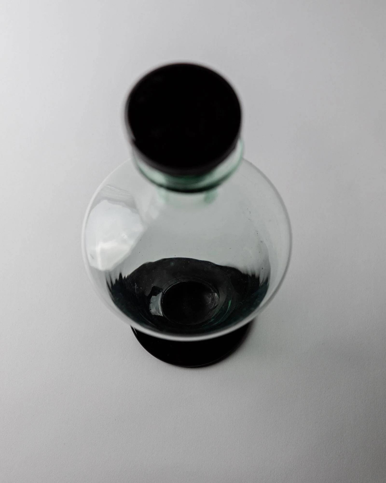 Vintage Murano glass carafe from the 1960s, green and black, with a stopper.