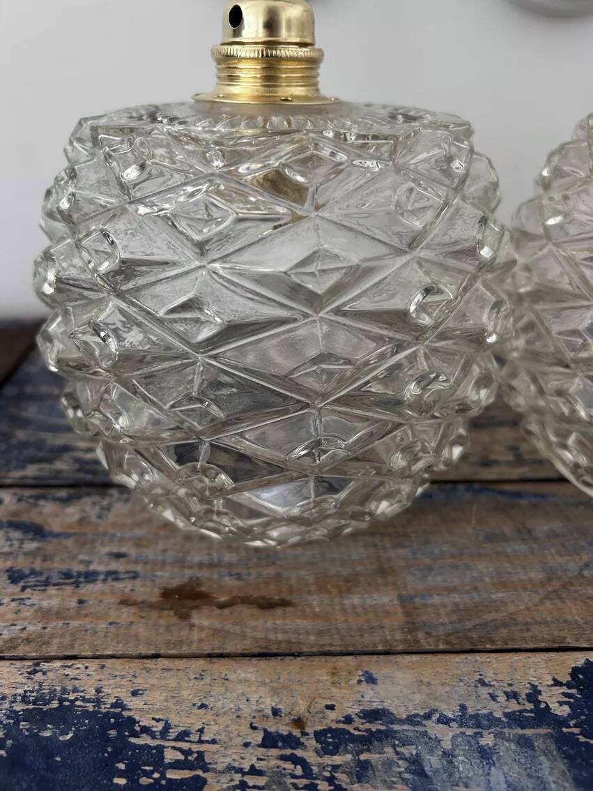 Pair of chiseled glass wall sconces