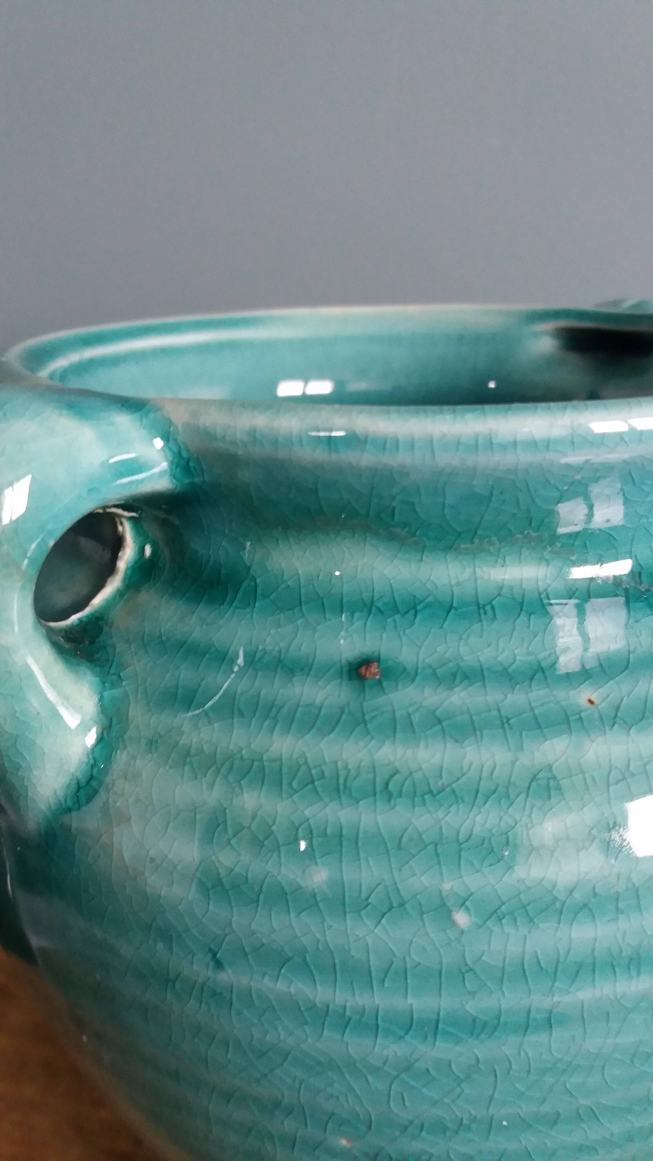Glazed green-blue ceramic vase