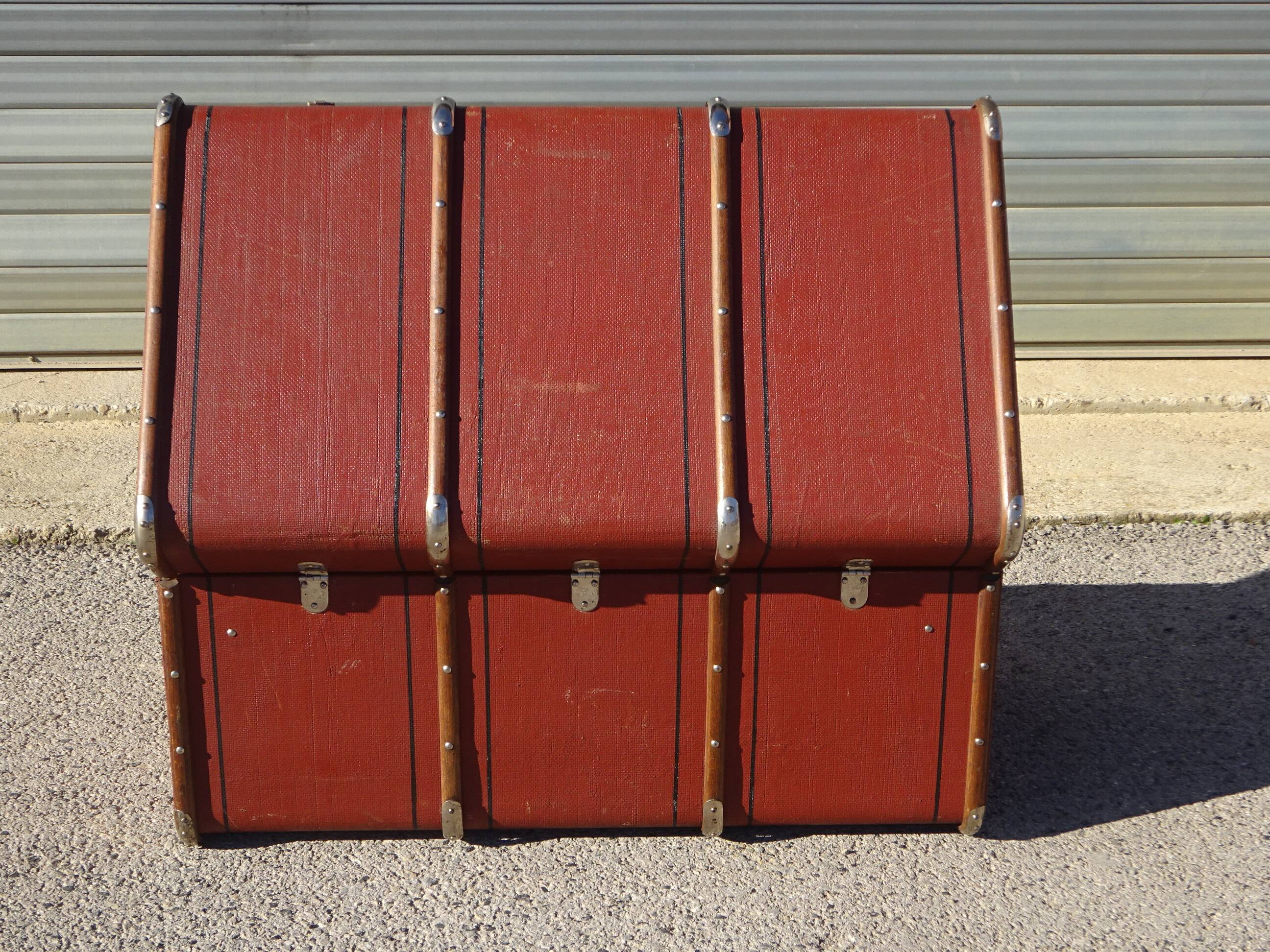 Old curved travel trunk